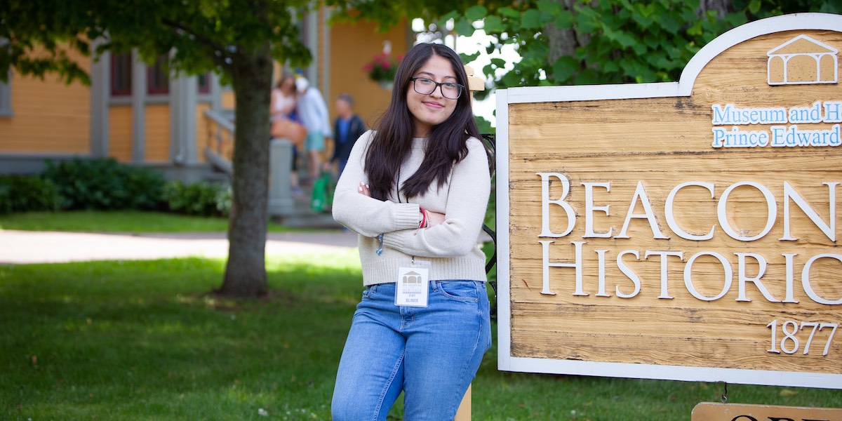 ͯŮ student Daniela Trinidad Lozano standing in front of Beaconsfield Historic House in Charlottetown