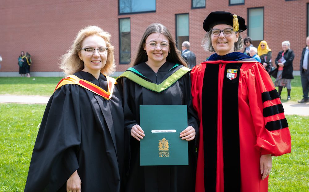 Dr. Nino Antadze poses with a colleague and student outside ͯŮ convocation