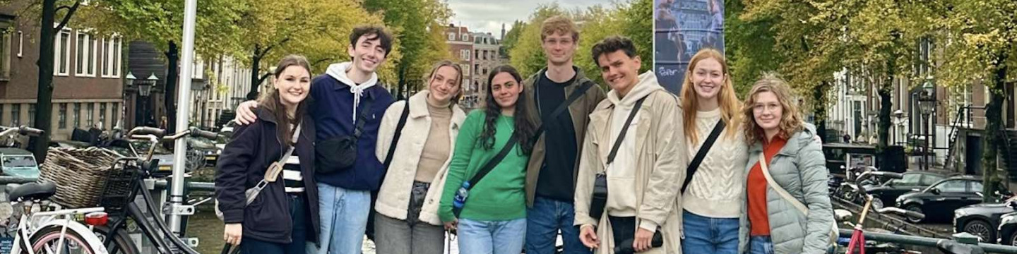ͯŮ student Peter with seven other students on a bridge in Brussels, Belgium