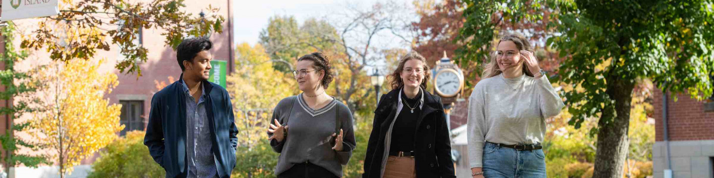 four students in the ͯŮ quad in fall